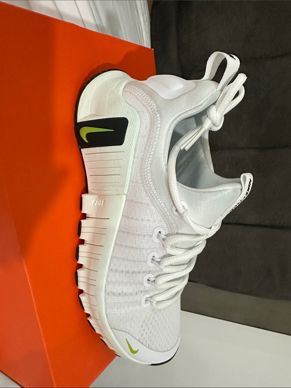 Nike White Sneakers with Volt Green Swoosh Accents